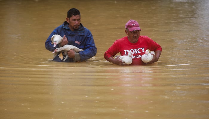 Death toll rises to 12 as Thailand, Malaysia face worst floods in decades