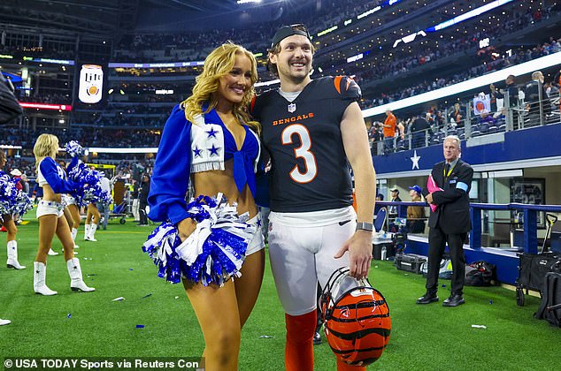 Cowboys cheerleader's two-word message caught on camera as boyfriend Cade York kicks for rivals Bengals