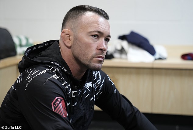Colby Covington walks into UFC fight bizarrely kissing huge Donald Trump bobblehead chain